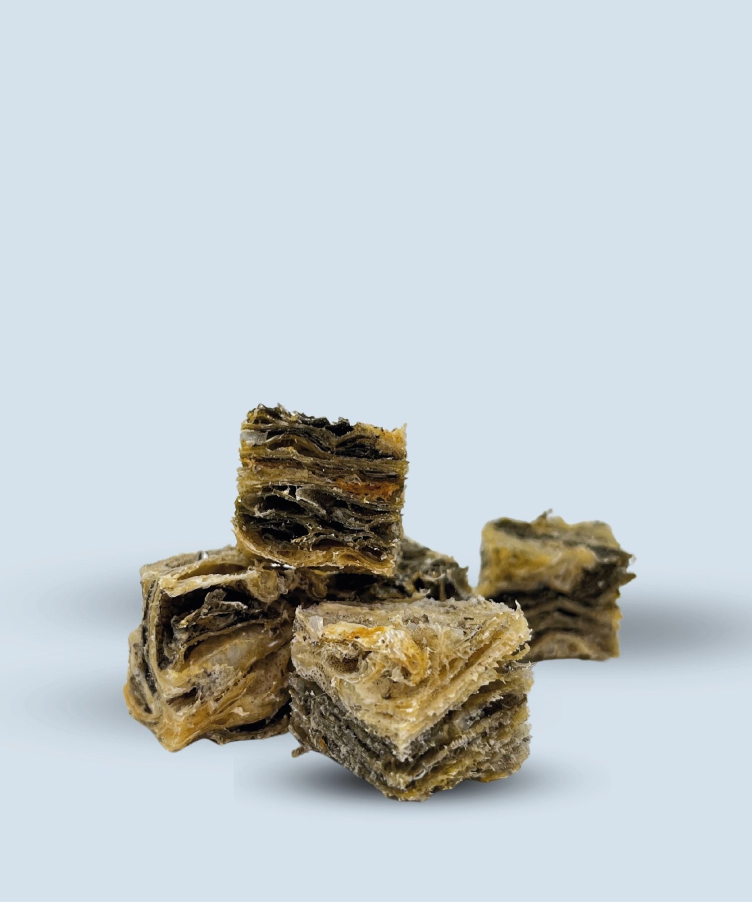 Nibblie Natural textured dental chews and yak bars for small dogs and puppies.