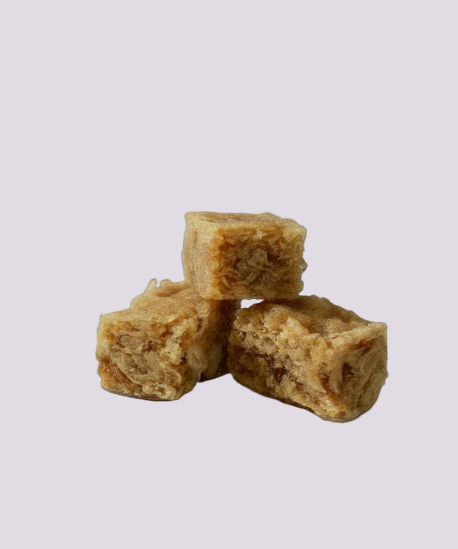 Three bite-size training cubes on a pale background, training treats category banner.

